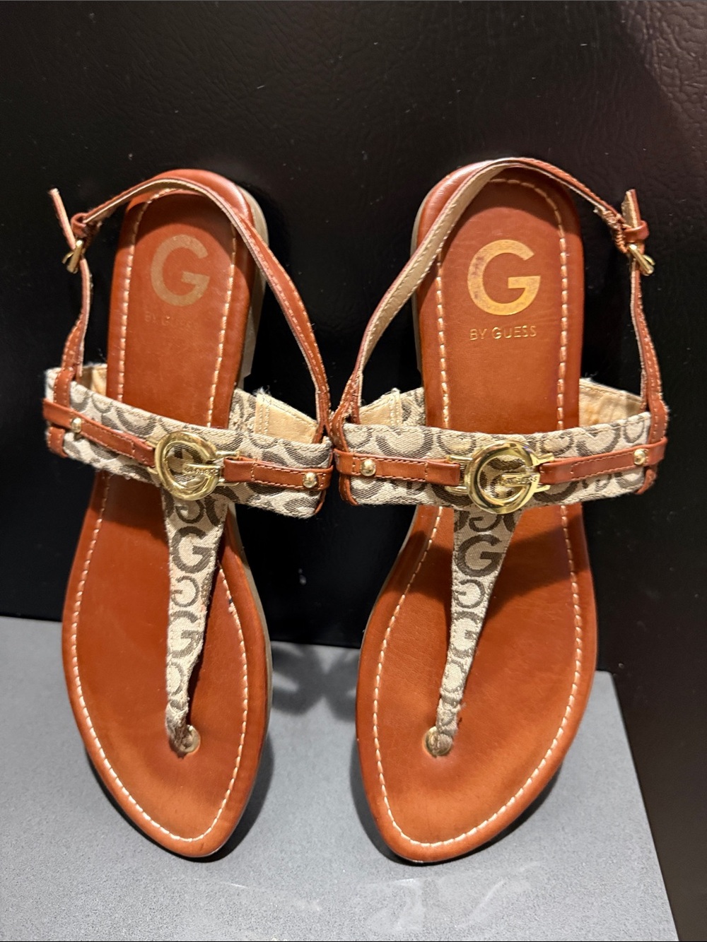 GUESS sandals in a brown and beige color is a size 11